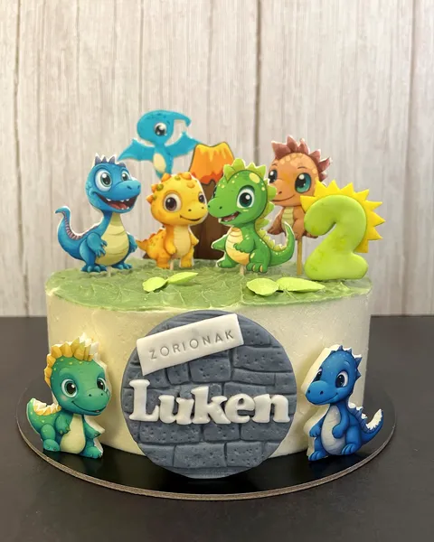 Tarta de dinosaurios bebé con el 2