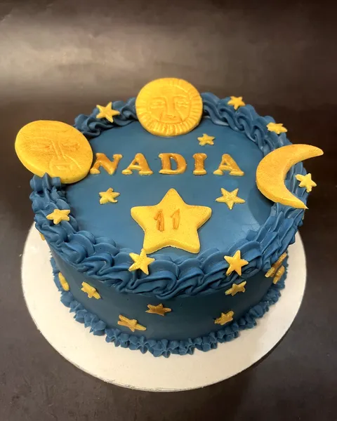 Tarta de sol, luna y estrellas con el 11