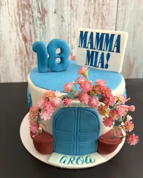 Tarta de Mamma Mia con letrero y el 18