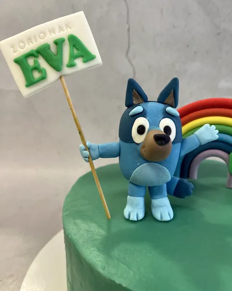 Bluey de fondant con cartel